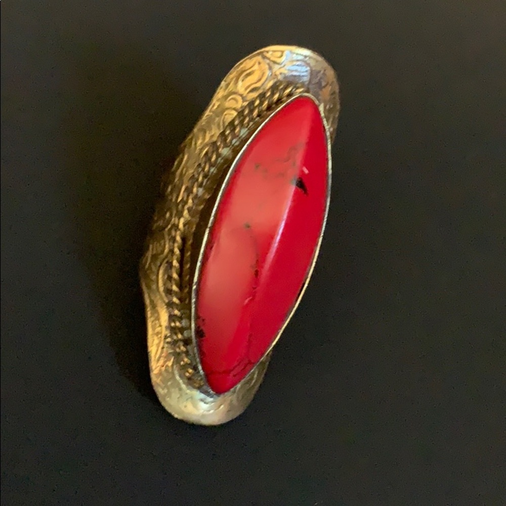 Red stones and Thumb-ring